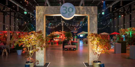 Staff party to celebrate 25 years of existence Anniversary arch at the entrance.